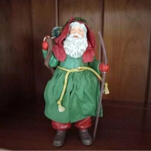 Clothtique Possible Dreams Traveling Santa Claus Coated Fabric Figurine Ornament